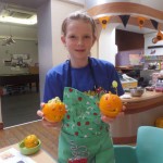 Girl with halloween lanterns